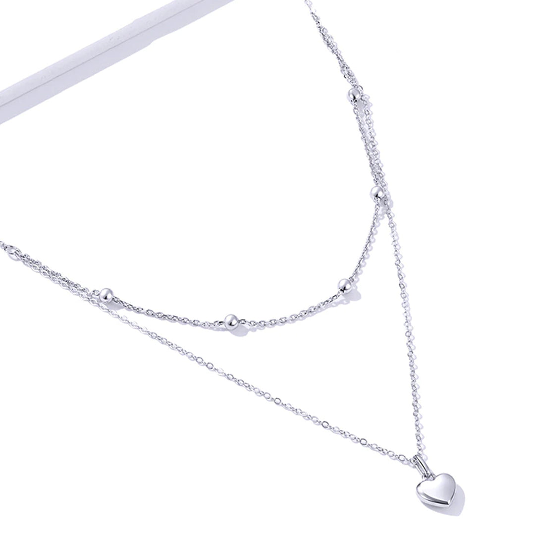 Collar de cadena de doble capa con colgante de corazón